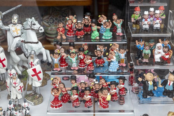 Typical Spanish souvenir products on display in shop window, Frigiliana, Axarquia, Andalusia, Spain, Europe