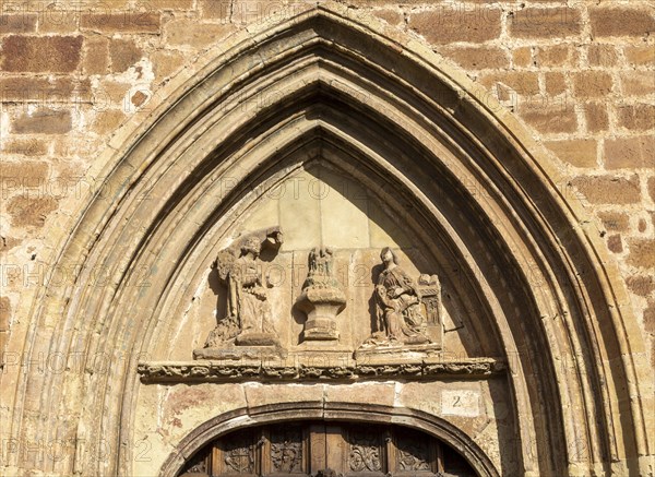 Aragonese Gothic architectural style carvings around doorway, Santa Maria la Mayor, Ezcaray, La Rioja, Spain, Europe