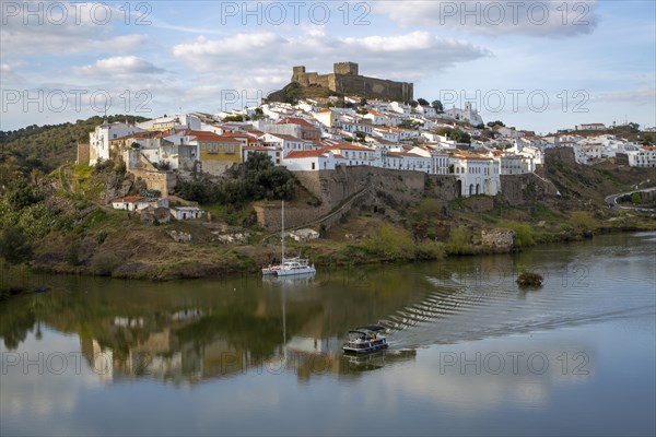 Historic hilltop walled medieval village of Mertola with castle, on the banks of the river Rio Guadiana, Baixo Alentejo, Portugal, Southern Europe, Europe