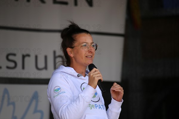 Karlsruhe: Tina Romdhani speaks about the situation of children, especially in schools, as part of the Corona protests against the measures taken by the federal government. The protests were organised by the Querdenken 721 Karlsruhe initiative