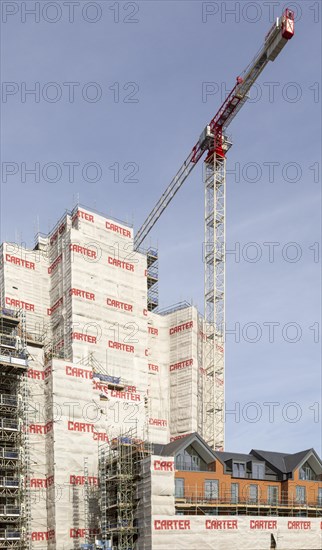 Work recommenced on the 'Wine Rack' building on the waterfront, Ipswich, Suffolk, England, UK, a property development stalled by the financial crash and again underway February 2019