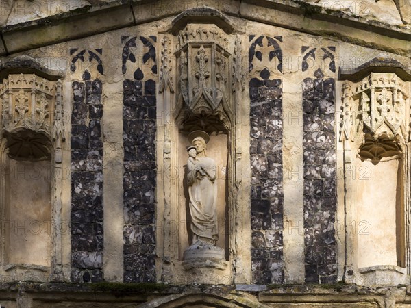 Church of Saint Mary of the Assumption, Ufford, Suffolk, England, UK statue of Blessed Virgin Mary and baby Jesus Christ above porch