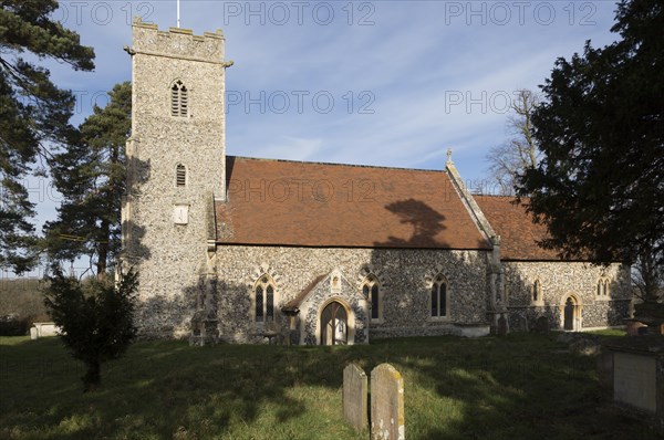 Village parish church and graveyard of Saint Peter, Sibton, Suffolk, England, UK