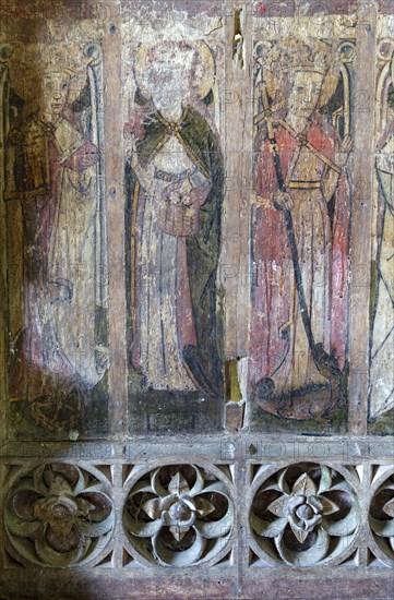 Medieval rood screen paintings of saints church of Saint Andrew, Westhall, Suffolk, England, UK