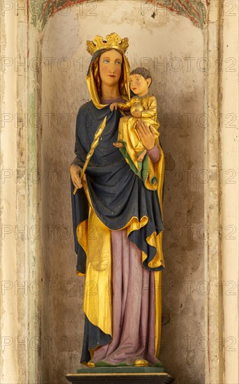 Interior historic village parish church, Wingfield, Suffolk, England, UK statue blessed Virgin Mary
