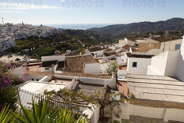 Rooftops of traditional pueblo blanco whitewashed houses in village of Frigiliana, Axarquia, Andalusia, Spain, Europe