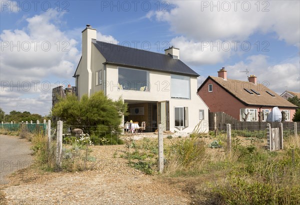 Ronina, a former MOD house redesigned by Casswell Bank architects on the beach at Shingle Street, Suffolk, England, UK