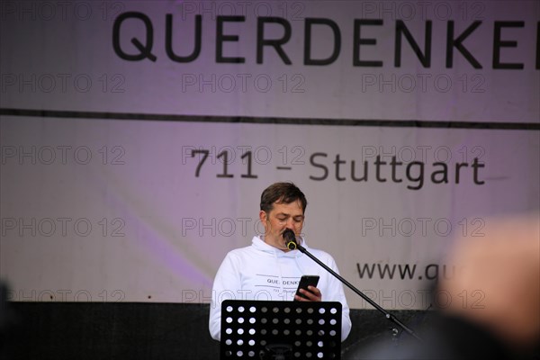 Michael Ballweg speaks at the large lateral thinkers' demonstration in Stuttgart. The motto of the demonstration was Fundamental rights are not negotiable