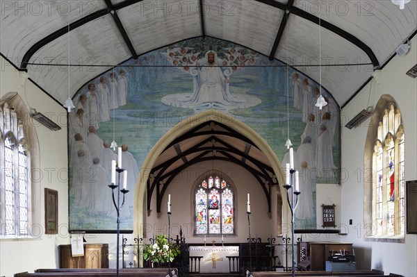 Painting above the chancel arch depicting a scene from the Apocalypse, probably late Victorian in the church at Stanton St Bernard, Wiltshire, England, UK