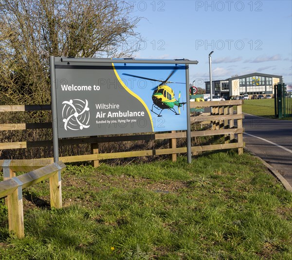 Sign at Air Ambulance charity helicopter emergency ambulance base, Semington, Wiltshire, England, UK