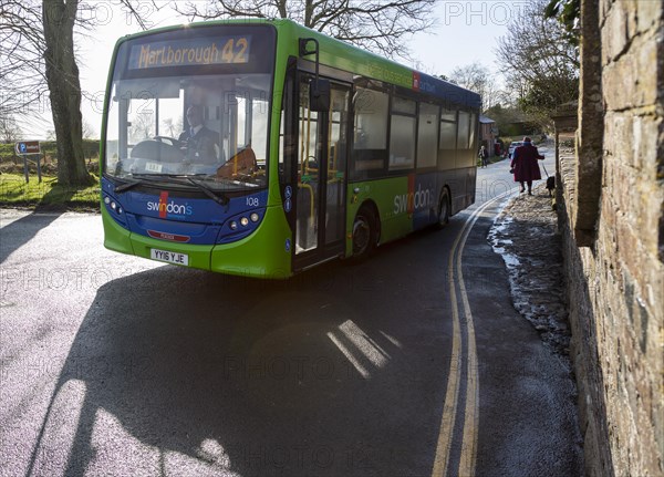 Green single decker service to Marlborough Swindon bus company bus at Avebury, Wiltshire, England, UK