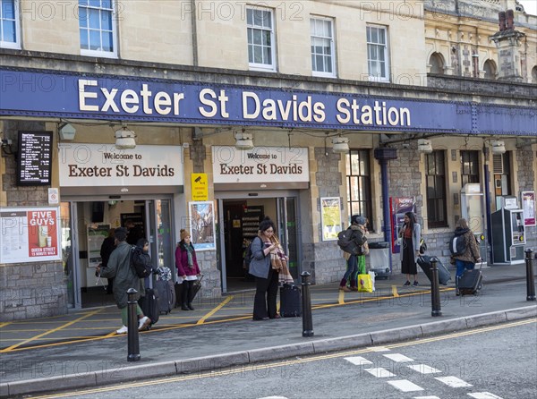 Passengers outside Exeter St David's railway station, Exeter, Devon, England, UK