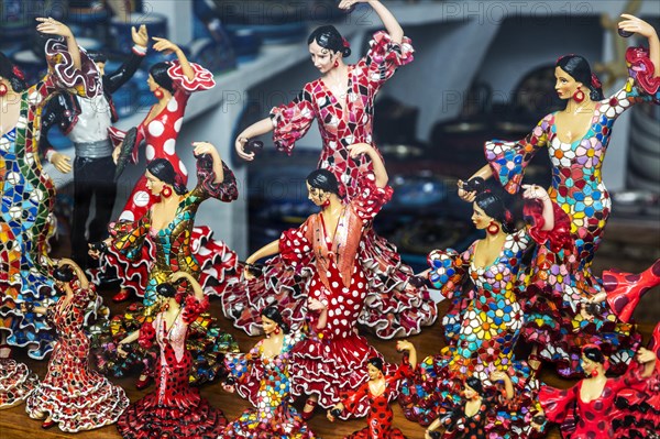 Flamenco dancers Spanish souvenir products on display in shop window, Frigiliana, Axarquia, Andalusia, Spain, Europe