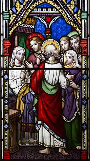Victorian stained glass window depicting the Raising of Dorcas circa 1858 by William Wailes (1808-1881), Urchfont church, Wiltshire, England, United Kingdom, Europe