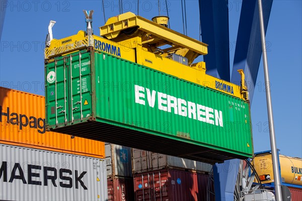An Evergreen Line container is loaded in the port of Mannheim, Germany. Supply bottlenecks and a sharp rise in container prices are currently affecting global trade