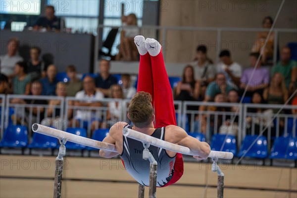 Heidelberg, 9 September 2023: Men's World Cup qualification in conjunction with a national competition against Israel. Glenn Trebing during his routine on parallel bars
