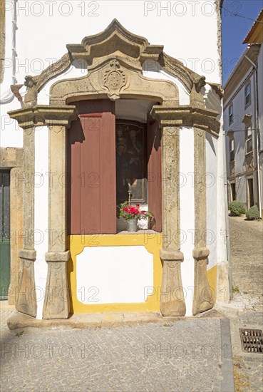 Small roadside religious Christian shrine on street, Castelo de Vide, Alto Alentejo, Portugal, southern Europe, Europe