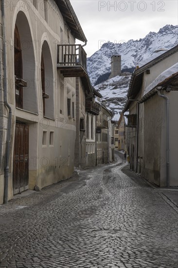 Alley of houses, historic houses, sgraffito, facade decorations, mountain peak, Ardez, Engadin, Grisons, Switzerland, Europe