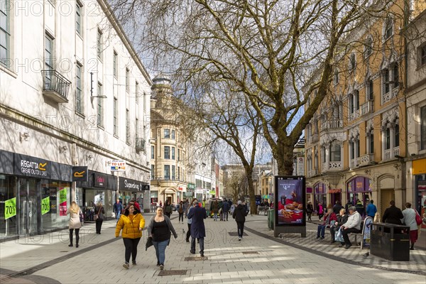 Shoppers city centre pedestrianised shopping area, Queen Street, Cardiff, South Wales, UK