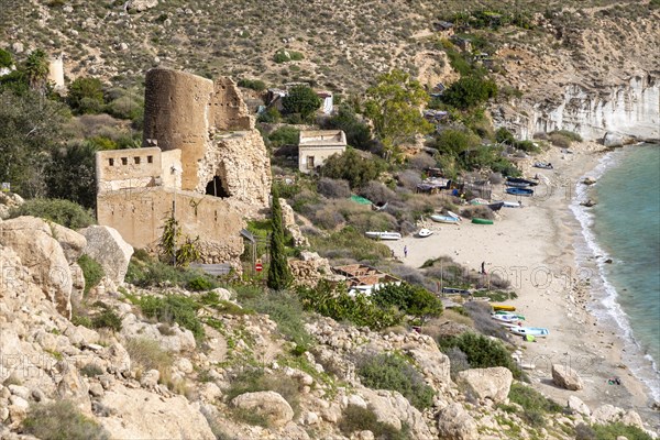 Castle, buildings and beach Cala de San Pedro, Cabo de Gata Natural Park, Nijar, Almeria, Spain, Europe