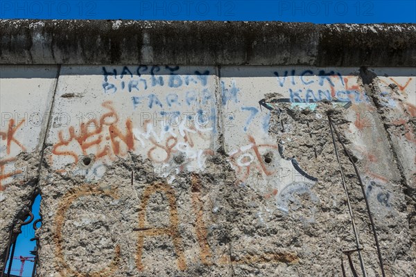 Preserved part of the Berlin Wall, GDR, East Germany, history, historical, politics, border, Eastern Europe, graffiti, memorial, monument, city wall, Berlin, Germany, Europe