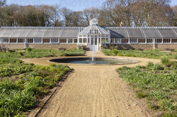 Garden designed by Piet Oudolf at Scampston Hall, Yorkshire, England, UK, Perennial Meadow pond and Pavilion
