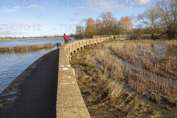 Flooding of River Avon at Maud Heath's causeway, Kellaways, Wiltshire, England, UK 24/12/20