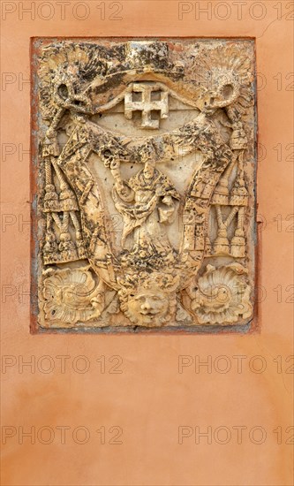 Historic carved stone christian symbols on building frontage, Cuenca, Castille La Mancha, Spain, Europe