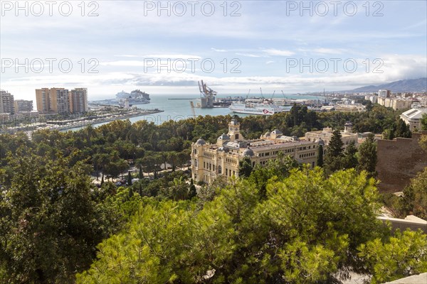 Cityscape view over city centre and dock area Malaga, Andalusia, Spain, Trasmediterranea ferry in port, city hall Ayuntamiento in centre, Europe