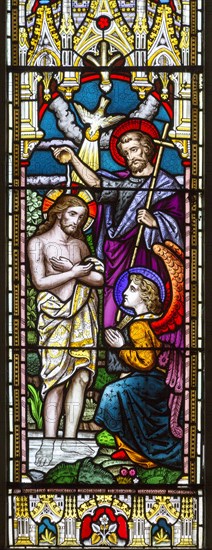Stained glass window in church of Saint John the Baptist, Badingham, Suffolk, England, UK circa 1873 by Cox and Son, baptising Jesus Christ