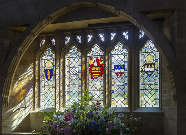 Heraldic stained glass window Inkpen church, Berkshire, England, UK