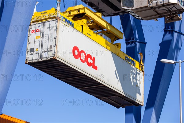 An OOCL Orient Overseas Container Line container is loaded in the port of Mannheim, Germany. Supply bottlenecks and a sharp rise in container prices are currently affecting global trade