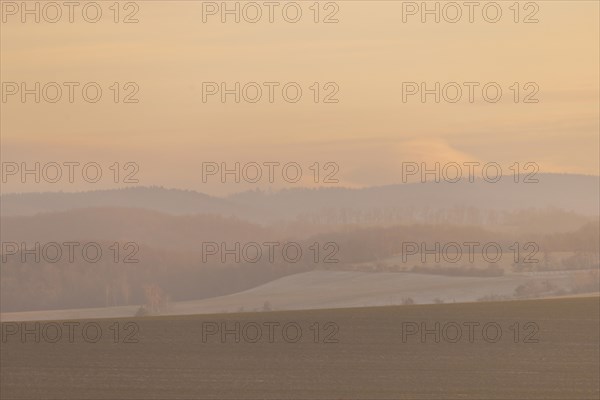 Evening light over fields near Krebs in the Osterzgebirge, Krebs, Saxony, Germany, Europe