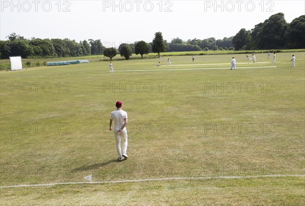 Cricket match at Sudbourne Hall cricket club ground, Sudbourne, Suffolk, England, UK