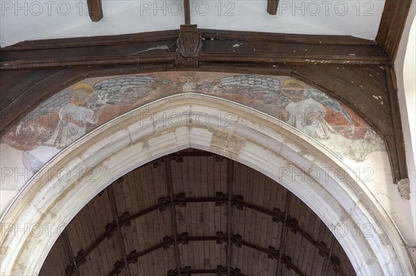 Medieval wall painting so angels on chancel arch, church of Saint Mary, Boxford, Suffolk, England, UK