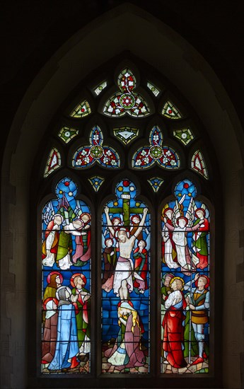 Victorian 19th century stained glass window, church of Bradfield Combust, Suffolk, England, UK, Crucifixion c 1869