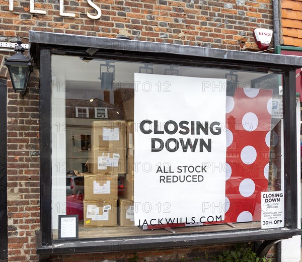 Closing down banner sign shop window, Jack Wills store, Marlborough, Wiltshire, England, Uk