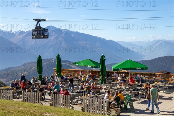 Rosshuette mountain station in Seefeld/Tyrol. Many tourists and locals take advantage of the sunny autumn day for an excursion (19 October 2022)