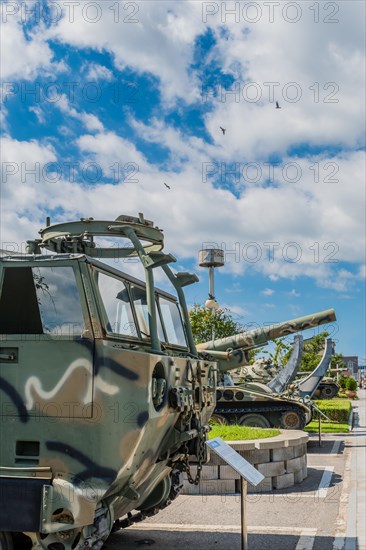 Perspective view of military vehicles on display at seaside park in Seosan, South Korea, Asia