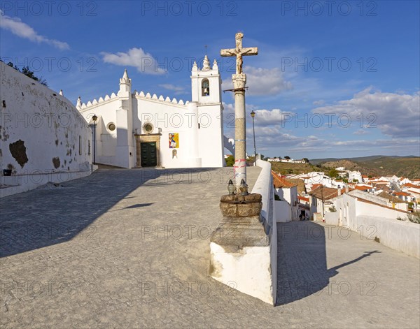 Historic whitewashed church Igreja Matrix in medieval village of Mertola, Baixo Alentejo, Portugal, Southern Europe, Europe