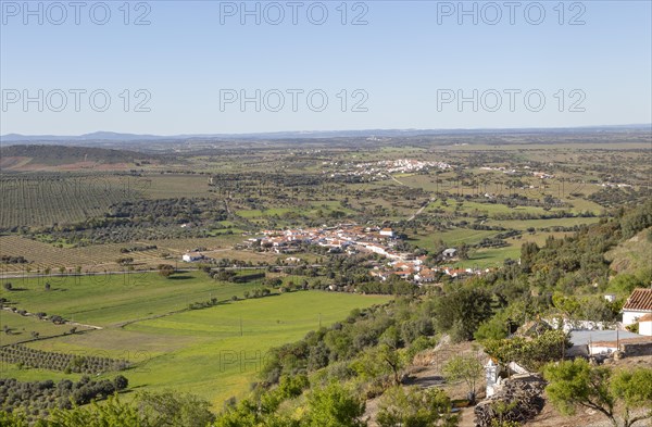 View over landscape from village of Monsaraz, Alto Alentejo, Portugal, southern Europe view north over countryside fields, villages and farms of Montado farming with oak trees, Europe