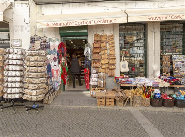 Shop displaying various tourist souvenir products on sale, city of Evora, Alto Alentejo, Portugal, southern Europe, Europe