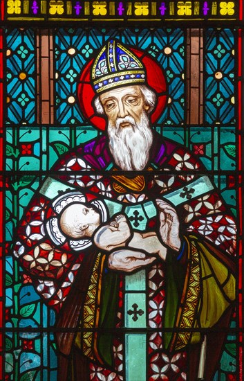 Stained glass window by Henry Holiday 1863 Shimpling church, Suffolk, England, UK Pre-Raphaelite artist, Simeon holding baby Jesus