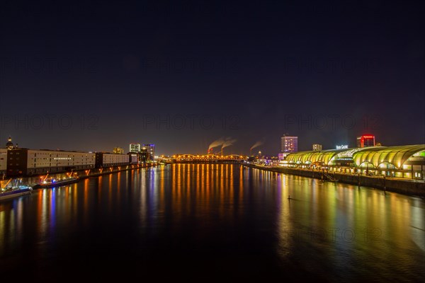 Night skyline of Ludwigshafen and Mannheim with the Rhine, the Rheingalerie in Ludwigshafen, the harbour of Mannheim and the Konrad Adenauer Bridge in the background