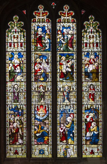 Stained glass window East Bergholt church, Suffolk, England, UK, five tiers of biblical scenes c 1865 by Lavers, Barraud and Westlake