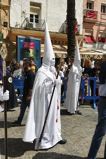 Semana Santa, procession with Nazarenos and tourists, celebrations in Cadiz, Spain, Europe