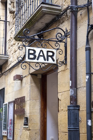 Sign for a bar above doorway entrance in village of Laguardia, Alava, Basque Country, northern Spain