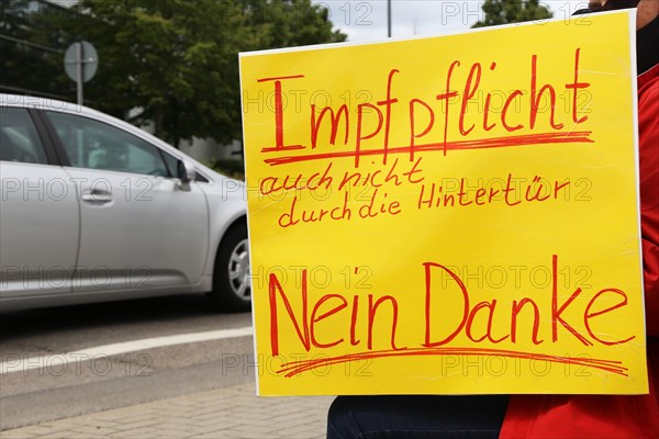 Rally against the corona measures: Demonstrators express their criticism of the corona policy with an authorised sign campaign in Industriestrasse in Ludwigshafen