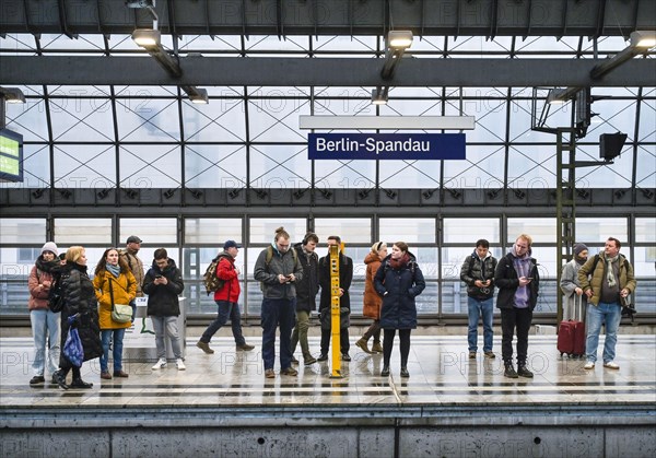 Waiting passengers, Spandau railway station, Berlin, Germany, Europe
