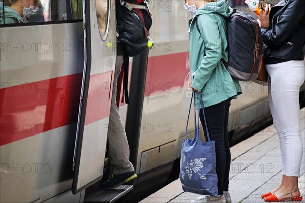 Stopping ICE at Mannheim main station with passengers boarding and alighting